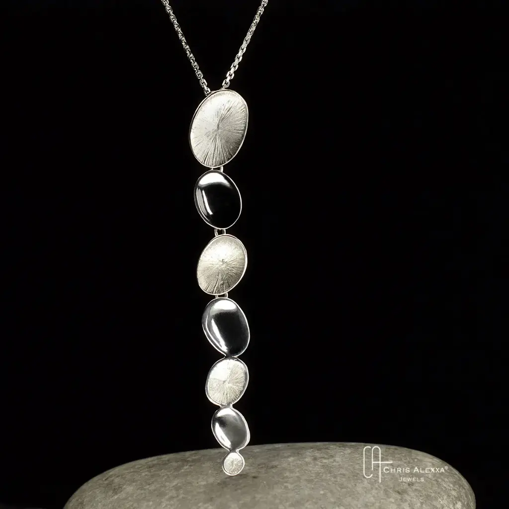 Pendentif argent Pollen twin