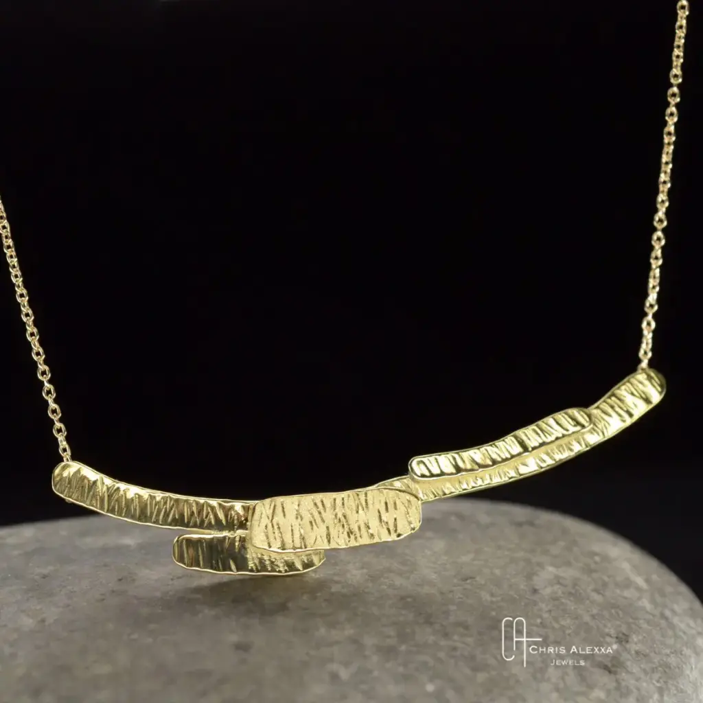 Pendentif or Scorza